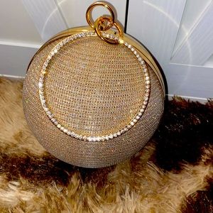Absolutely stunning gold world globe clutch